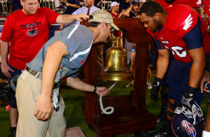 Owls interim head coach Brian Wright rings the Taylor Victory Bell for his first time after the Owls win over NMSU. 