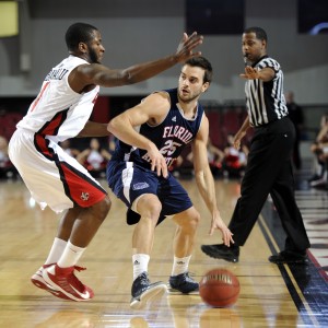 Owls guard Pablo Bertone trapped by a ULL defender. Bertone totaled 13 points in FAU's 58-57 loss. Photo courtesy of ULL Media Relations.