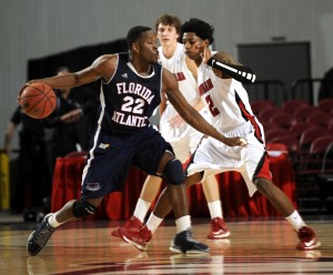 FAU leading scorer Greg Gantt attempting to juke the Ragin' Cajuns. Gantt had a team-high 18 points in the 58-57 loss. Photo courtesy of ULL Media Relations.