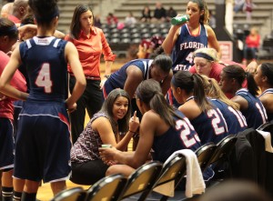 Owls head coach Kellie Lewis-Jay instructing her squad. FAU lost 77-45 to Arkansas-Little Rock, their worst defeat of the season. Photo by Matt Johnson.