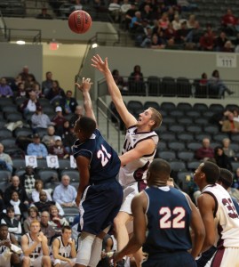 FAU forward Jordan McCoy contesting a shot during the Owls' 65-62 loss to Arkansas-Little Rock. Photo by Matt Johnson.