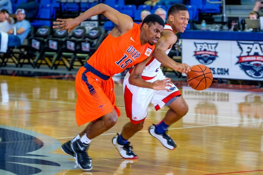 Owls junior guard Marquan Botley (2) tries to pass Miners defender Tevin Caldwell (15) during FAUs 89-82 loss to UTEP last Saturday. Mohammed F. Emran | Staff Photographer
