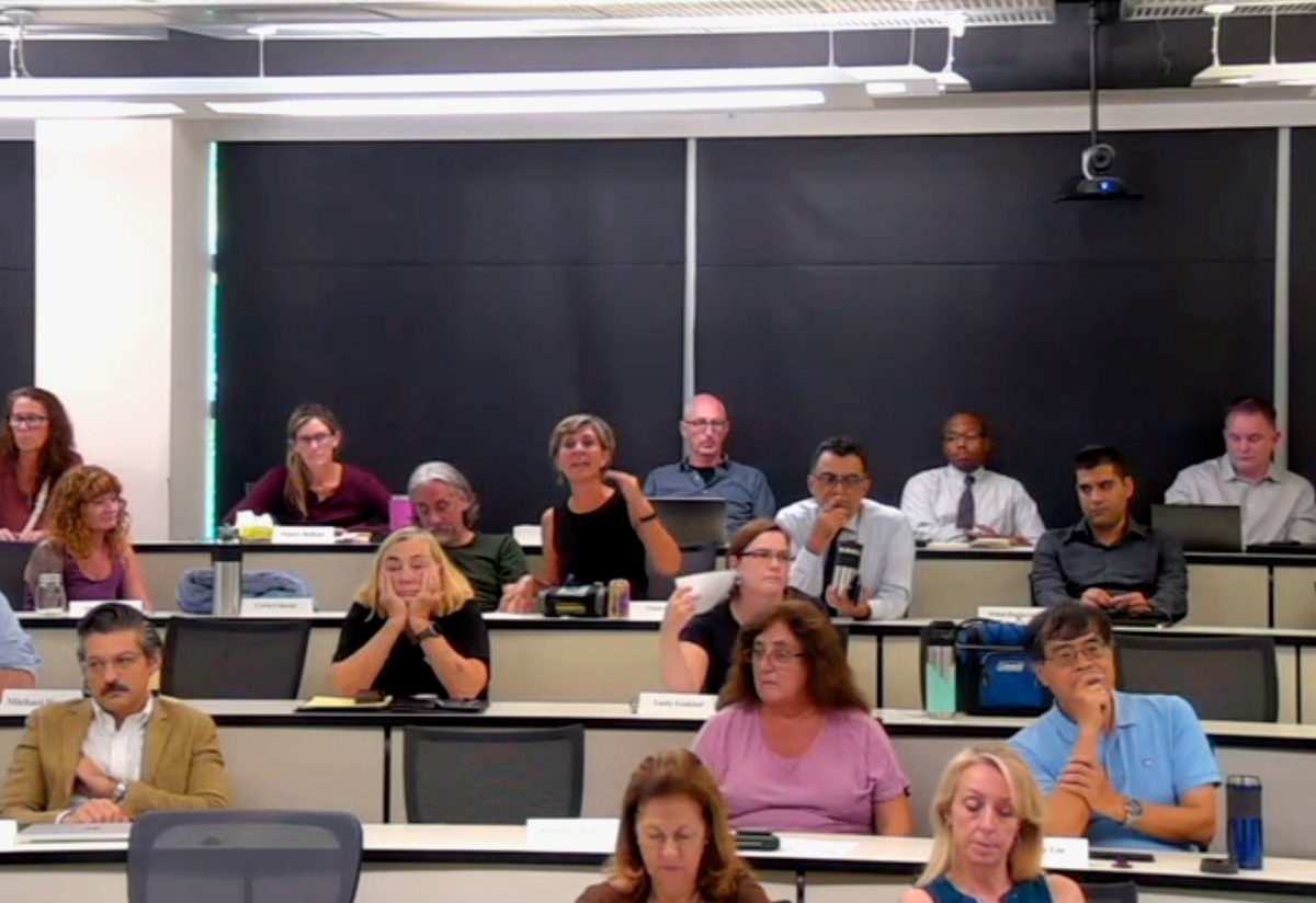 Faculty members during the heated discussion about the Post-Tenure Review policy at the Sept. 17 Faculty Senate Meeting.