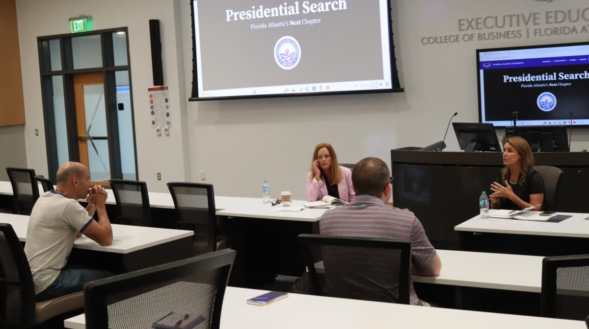 Search commitee Chair Sherry Murphy responds to a question posed by math instructor Robert Lubarsky.