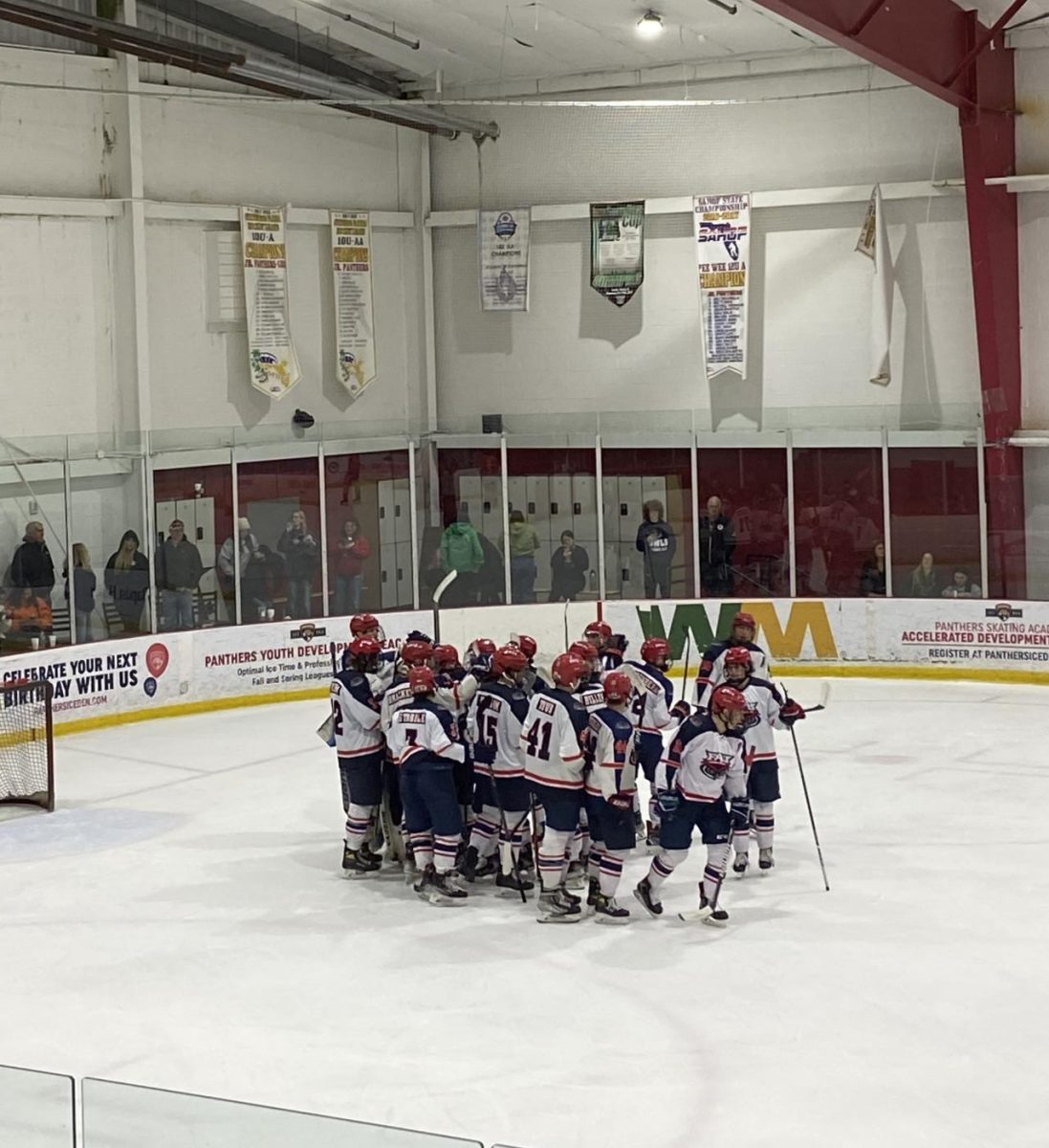 FAU Ice Hockey Club celebrating after their win against the University of Florida Gators in on Feb. 3, 2024.