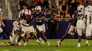 Florida Atlantic getting tackled in their rivalry game against Florida International on Sept. 14,2024. 