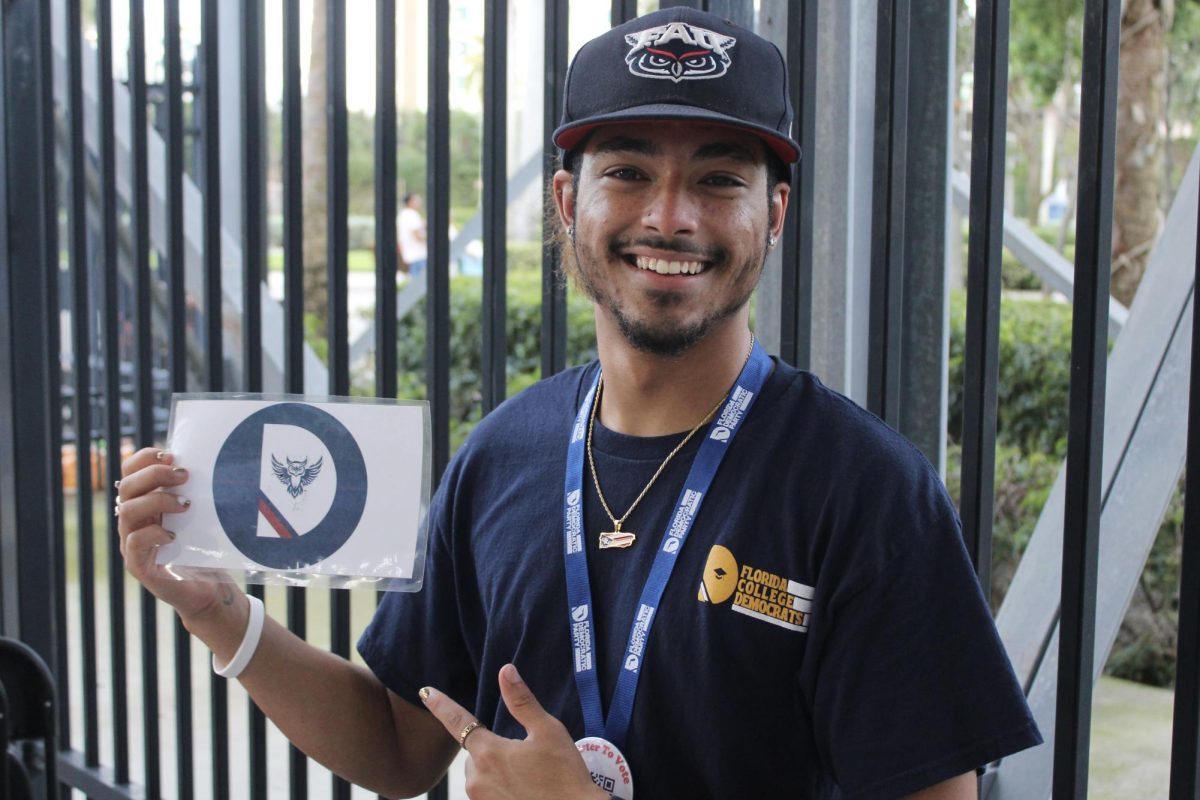 Trevian Briskey, the current president of the FAU College Democrats, represented the organization at the "Owl Involved" event on Aug. 17, where all campus organizations were tabling.