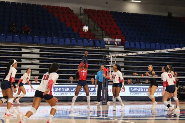 Florida Atlantic’s defensive specialist Brianna Anderson passing the ball to outside and right side hitter Valeria Rosado in their game on Sept. 20, 2024 against Mercer University. 