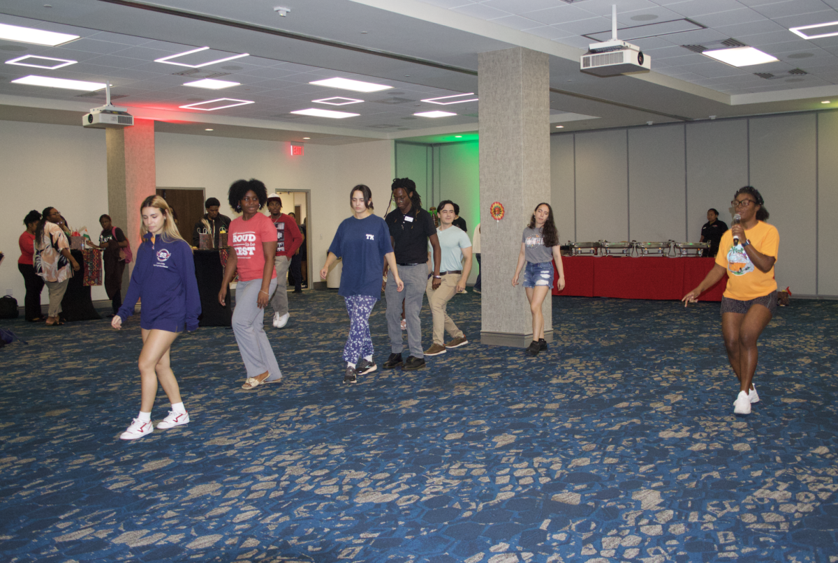 Students being taught an Afrobeat line dance by Daniella Dara Coby at Program Board's "Afrobeats Dance and Dine" event on Sept. 17.