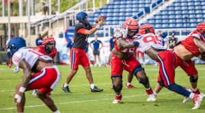 FAU quarterback Cam Fancher taking a snap in FAU's 2024 Spring Game