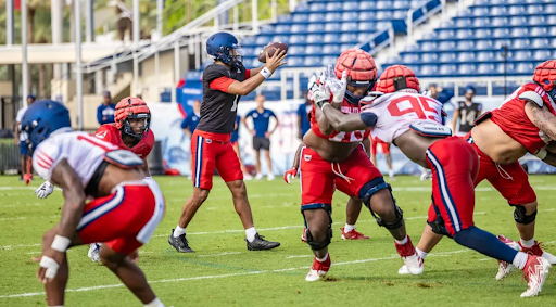 FAU quarterback Cam Fancher taking a snap in FAU's 2024 Spring Game