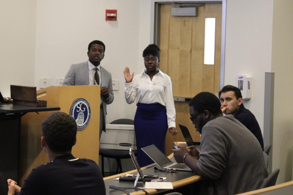 Medgine Present was sworn in as Speaker of the House by FAU's Boca Raton campus governor Raymond Adderly, taking the "Oath of Office" on Oct. 4.