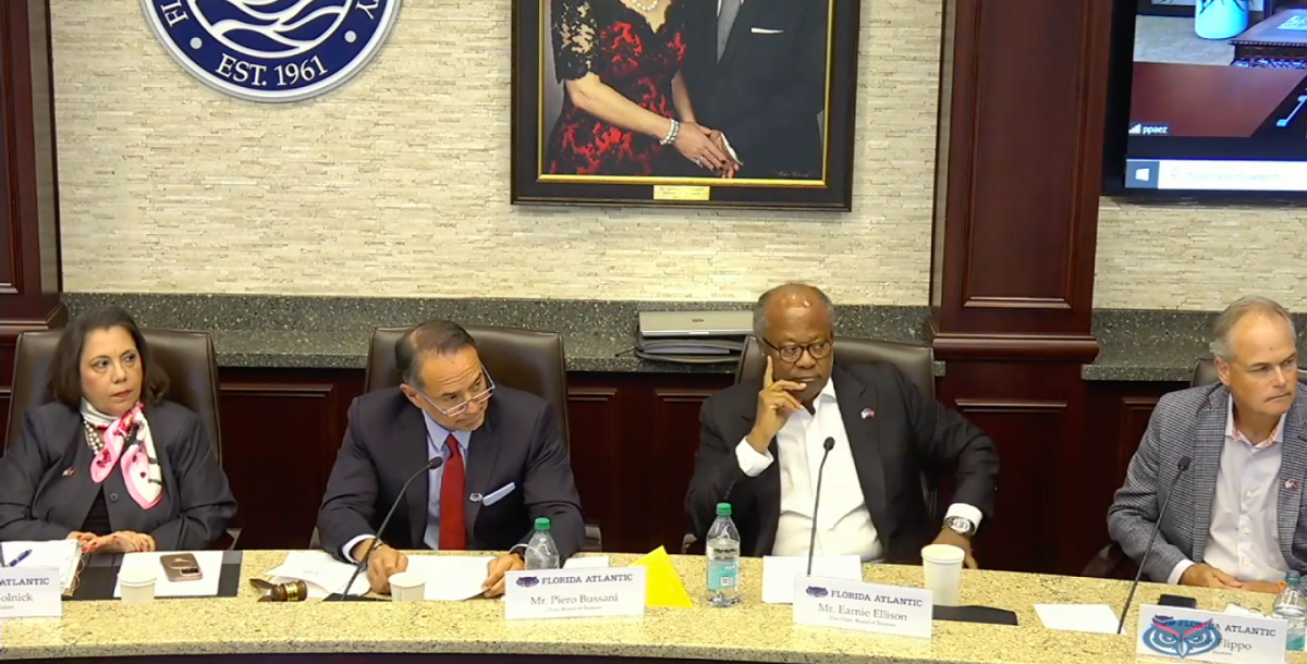 (Left to right) FAU Interim President Stacy Volnick, BOT Chair Piero Bussani, BOT Vice Chair Earnie Ellison, and Trustee Robert Flippo listen as other trustees approve the position criteria during Tuesday's meeting. Screenshot courtesy of the BOT meeting livestream.