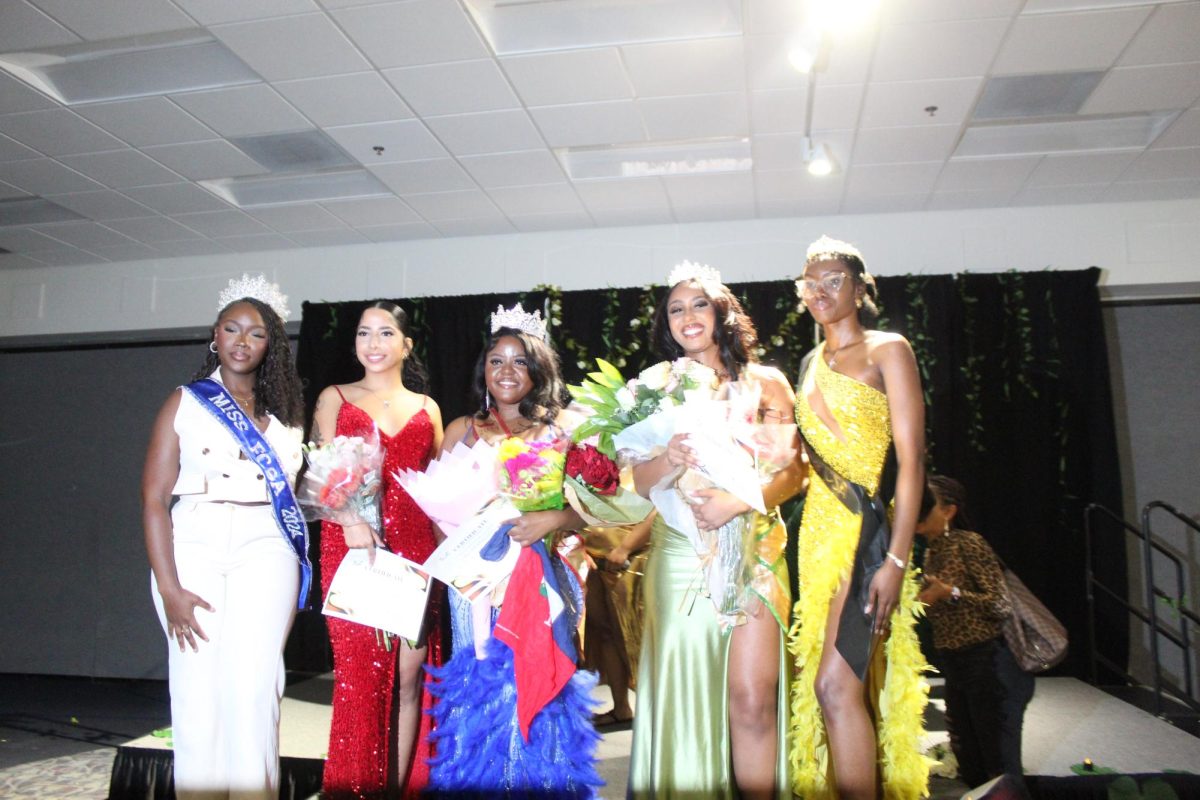 Abigail Codner, Miss Florida Caribbean Student Association (far left) alongside this year's Miss FAU CSA contestants and 2023's Miss FAU CSA winner (far right).