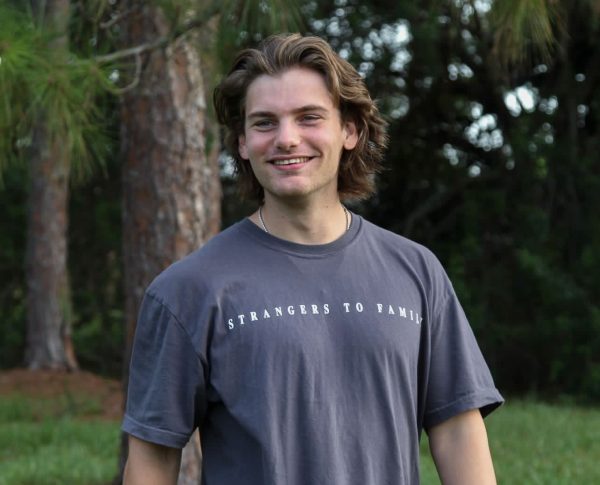 Dalton Tice pictured wearing merch for his brand HEROSE, which aims to spread God’s love through acts of kindness.