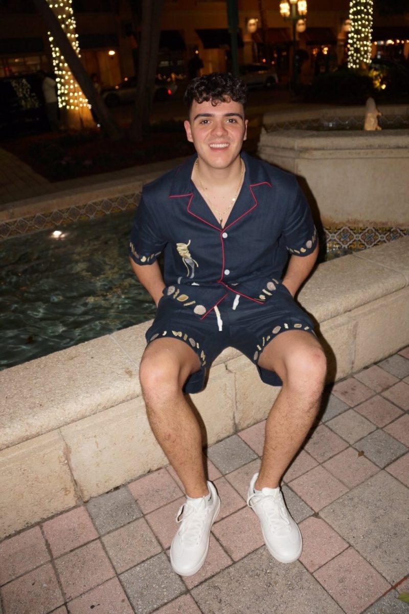 Angelo Galestro, or Cousin Angelo in front of a fountain in Mizner Park.