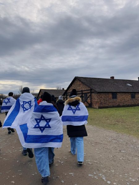 Students walking through Auschwitz-Birkenau.