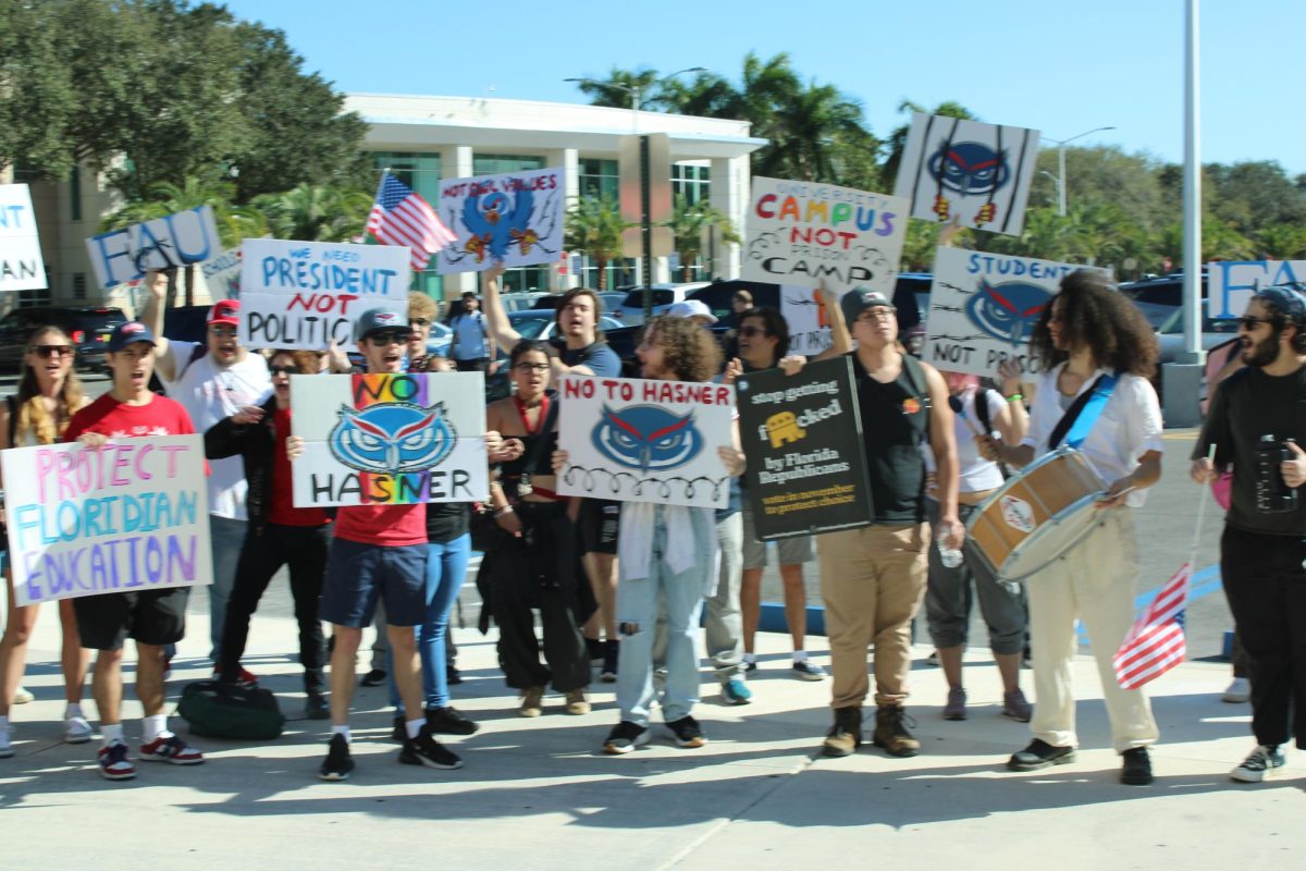 Students protesting against presidential finalist Adam Hasner on Feb 7. 