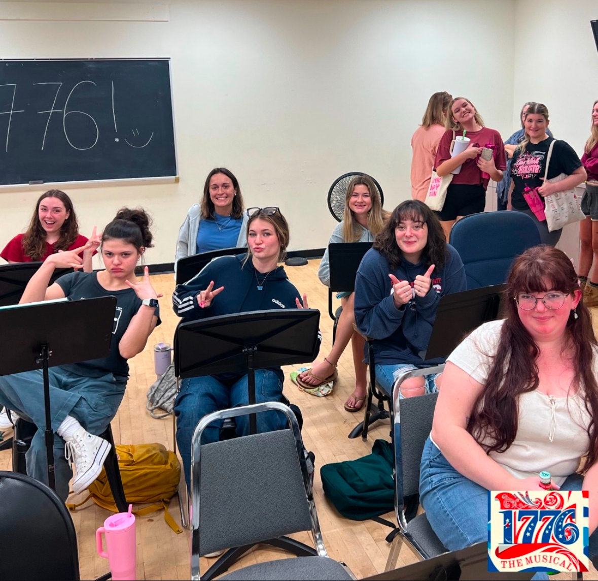 FAU actors and actresses reviewing their script for their production of "1776," the musical.
