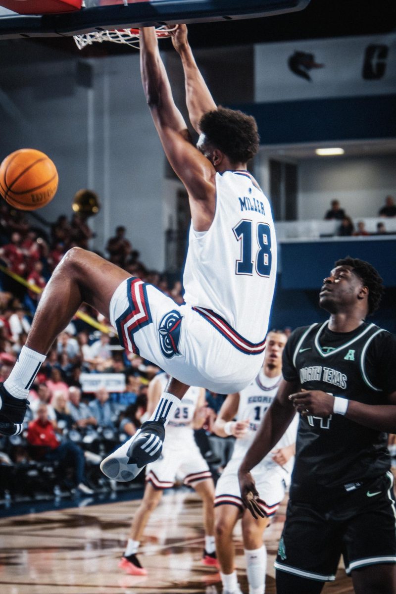 Forward Baba Miller dunking the ball against the University of North Texas on Feb. 27. 