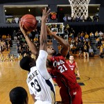 Forward Jordan McCoy attempting a tough shot near the basket. McCoy had a team-high 19 points in the Owls' 84-65 loss. Photo by Alex Hernandez.