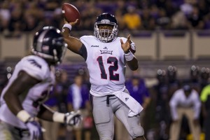 FAU quarterback Jaquez Johnson throws downfield during Thursday night's game against East Carolina. The Owls lost to ECU 31-13 in their Conference USA debut. Photo courtesy of Rob Goldberg Jr./ECU Media Relations.