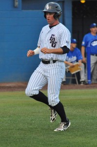 Center fielder Nathan Pittman heads to the dugout after scoring a run in the bottom of the first inning. Pittman had one run, two hits, and one RBI in the Friday 3-2 loss against Middle Tennessee. Photo by Michelle Friswell.