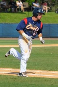 Center fielder Nathan Pittman drove in FAU's only run with his single to right field. The play scored third baseman Ricky Santiago in the 1-1 tie against Troy on Thursday night. Photo by Michelle Friswell