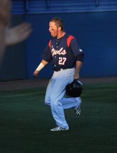 Center fielder Nathan Pittman reacts to scoring a run in the bottom of the ninth inning that brought the Owls one run away from winning the game. Photo by Michelle Friswell.
