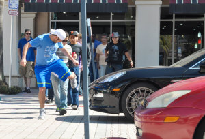 During Zdorovetskiy’s meet and greet (above and below), fans took part in “the invisible box” prank, where they would pretend there was an object in front of the car to get a reaction from the driver. Photo by Michelle Friswell.