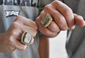 Outfielder Geoff Jimenez and pitcher Bo Logan model the 2012 Sun Belt championship rings. The Owls are projected to repeat as champions in 2013 by Baseball America and the Sun Belt coach’s poll. Photo by Michelle Friswell.