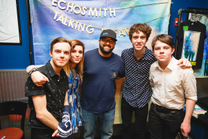 Ocean engineering major Peter Amirato takes a group photo with Echosmith at the photobooth. Photo by Sean Webster