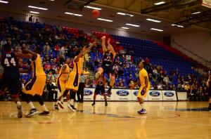 Pablo Bertone attempts a mid range runner. Bertone scored 12 points in the win. Photo by Max Jackson 