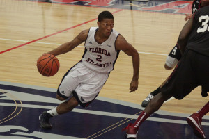 Marquan Botley attacks the defense after using a screen. Botley had 23 points in the win. Photo by Max Jackson