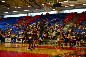 Grant takes it to the hoop. 30 pounds lighter, the combo gaurd has been running his defenders ragged. Photo by Max Jackson.