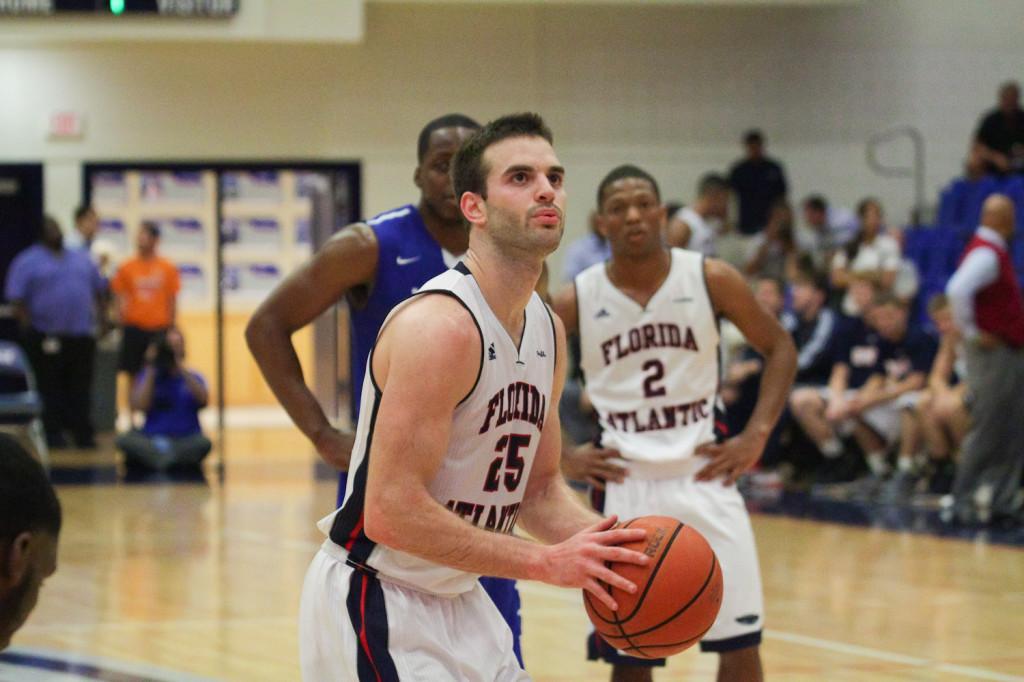 Pablo Bertone attempts a free throw as his teammate Marquan Botley looks on. Bertone and Botley combined for 36 of the 63 FAU points on the night. Photo by Max Jackson