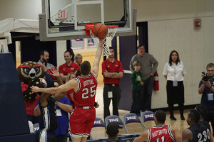 Pablo Bertone lays in an easy bucket. Bertone scored 15 points in the loss. Photo by Max Jackson