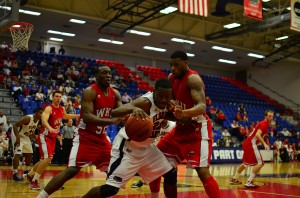 Greg Gantt battling through a double-team. FAU's leading scorer recorded a game-high 31 points in the win over Western Kentucky. Photo by Max Jackson.