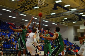 FAU leading scorer Greg Gantt driving through the lane. Despite a dislocated finger, Gantt had a team-high 22 points against North Texas. Photo by Max Jackson.