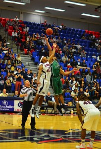 Owls forward Kelvin Penn tips off against North Texas' Tony Mitchell. Photo by Max Jackson.