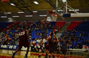 Senior forward Jordan McCoy attempting a floater in traffic. Morrow finished with a double-double (11 points, 13 rebounds) in FAU's 76-71 win over ULM. Photo by Max Jackson.