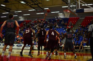 Guard Richard Morrow laying in his only basket against ULM. Photo by Max Jackson.