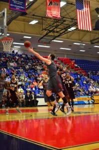 Dragan Sekelja flipping in a bucket. The 7-foot center had 3 points in the Owls' win. Photo by Max Jackson.