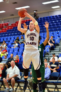 Kimberly Smith hits a late three pointer that helped force overtime. Smith scored 17 points and grabbed 10 rebounds. Photo by Ryan Murphy 