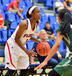 Latavia Dempsey surveys the perimeter. Dempsey scored 24 points in the loss. Photo by Ryan Murphy