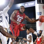 Guard Greg Gantt dishing the ball to his teammate. He recorded three assists in a losing effort. Photo by Alex Hernandez.