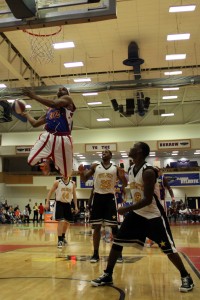 Harlem Globetrotter "Jet" throws down a windmill dunk. Photo by Melissa Landolfa.