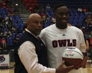 Before Thursday's game against Troy, Owls leading scorer Greg Gantt was honored for his accomplishments this season. Gantt posed next to FAU head coach Mike Jarvis. Photo by Melissa Landolfa.