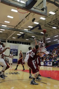 Greg Gantt driving hard to the basket. Gantt finished with a game-high 23 points in FAU's 80-59 victory over Troy. Photo by Melissa Landolfa.