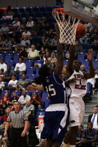 Guard Cavon Baker shooting against Lynn University this past basketball season. Photo by Melissa Landolfa.